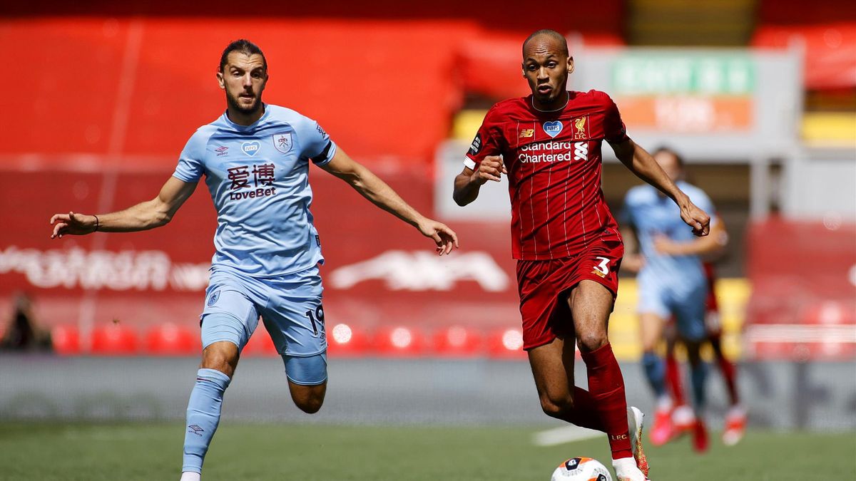 Fabinho of Liverpool battles for possession with Jay Rodriguez of Burnley