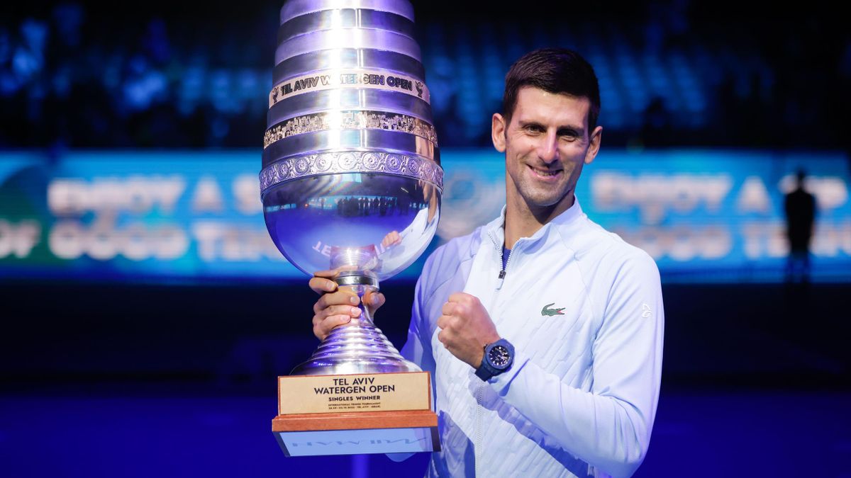 Serbia's Novak Djokovic poses with the trophy after winning against Marin Cilic of Croatia in the final match of the Tel Aviv Watergen open tournament, in Tel Aviv, Israel