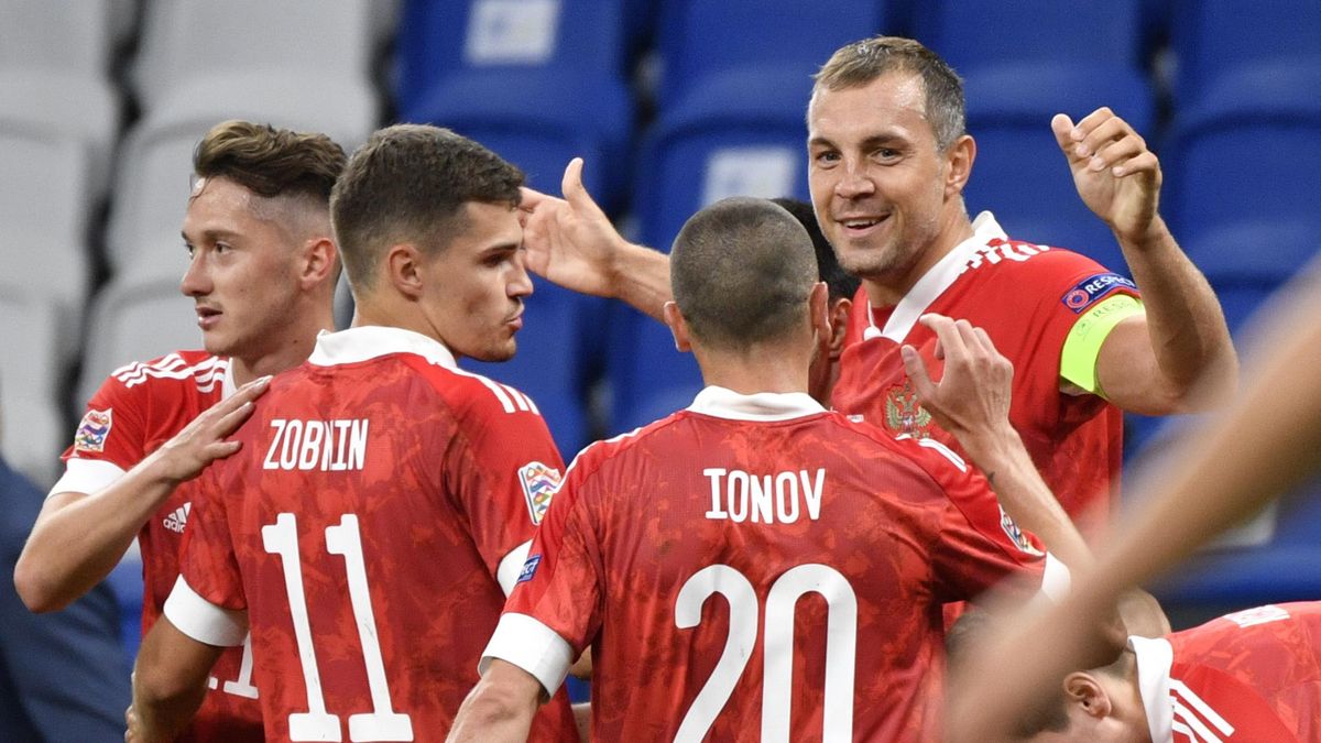 Russia's forward Artyom Dzyuba celebrates with teammates after scoring a goal during the UEFA Nations League football match Russia against Serbia at Moscow's VTB Arena on September 3, 2020