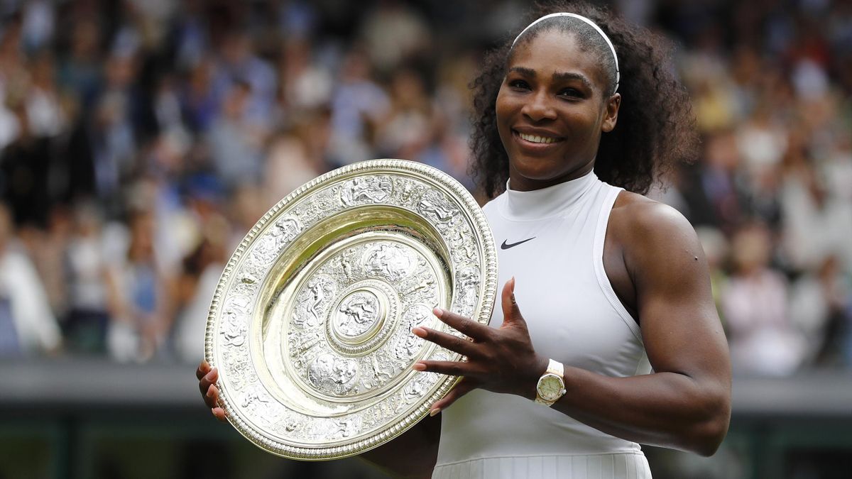 Wimbledon 2016: Serena Williams celebrates winning her womens singles final match against Germany's Angelique Kerber with the trophy
