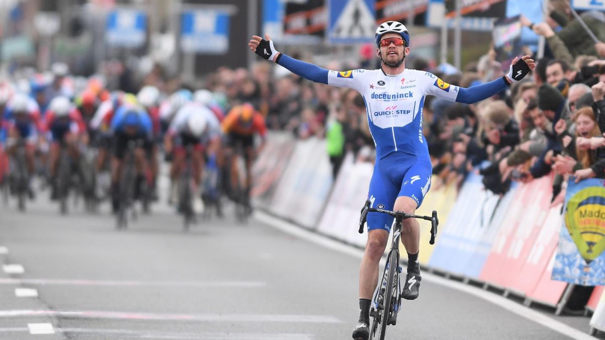 Danish Kasper Asgreen of Deceuninck - Quick-Step celebrates as he crosses the finish line to win the 71st edition of the Kuurne-Brussels-Kuurne one day cycling race, 200 km from Kuurne to Kuurne via Brussels, Sunday 01 March 2020