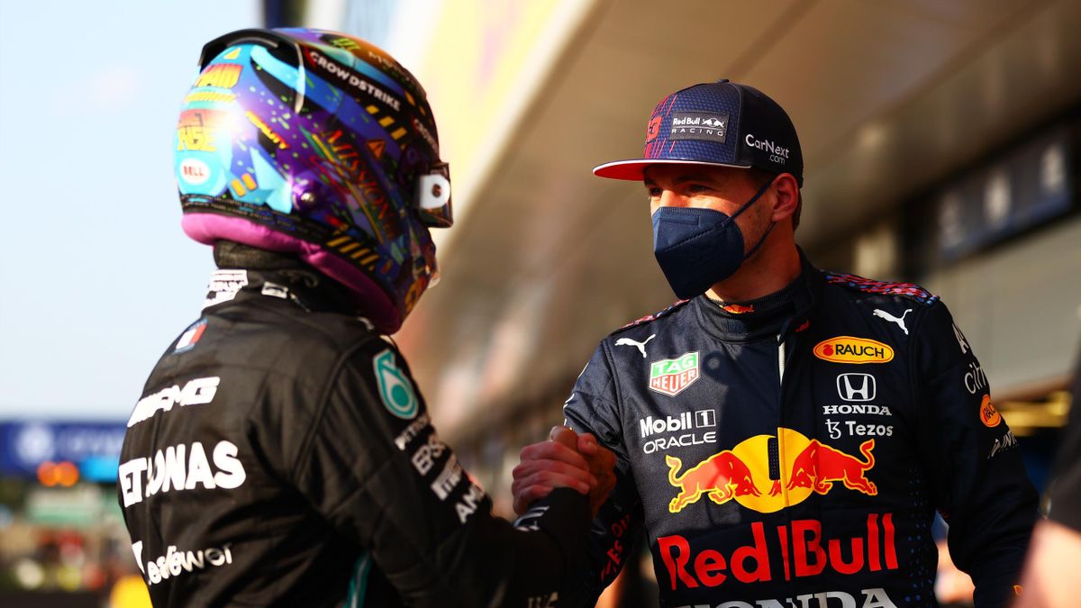 Fastest qualifier Lewis Hamilton of Great Britain and Mercedes GP and second fastest qualifier Max Verstappen