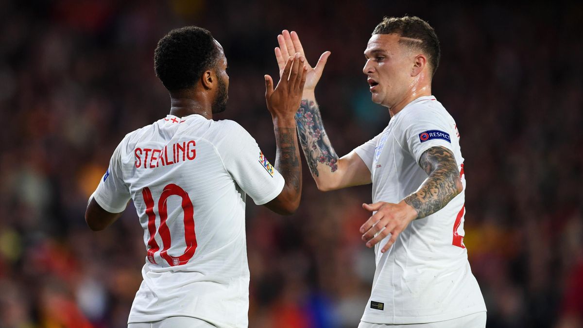 Raheem Sterling of England celebrates as he scores his team's first goal with Kieran Trippier of England during the UEFA Nations League A Group Four match between Spain and England at Estadio Benito Villamarin on October 15, 2018