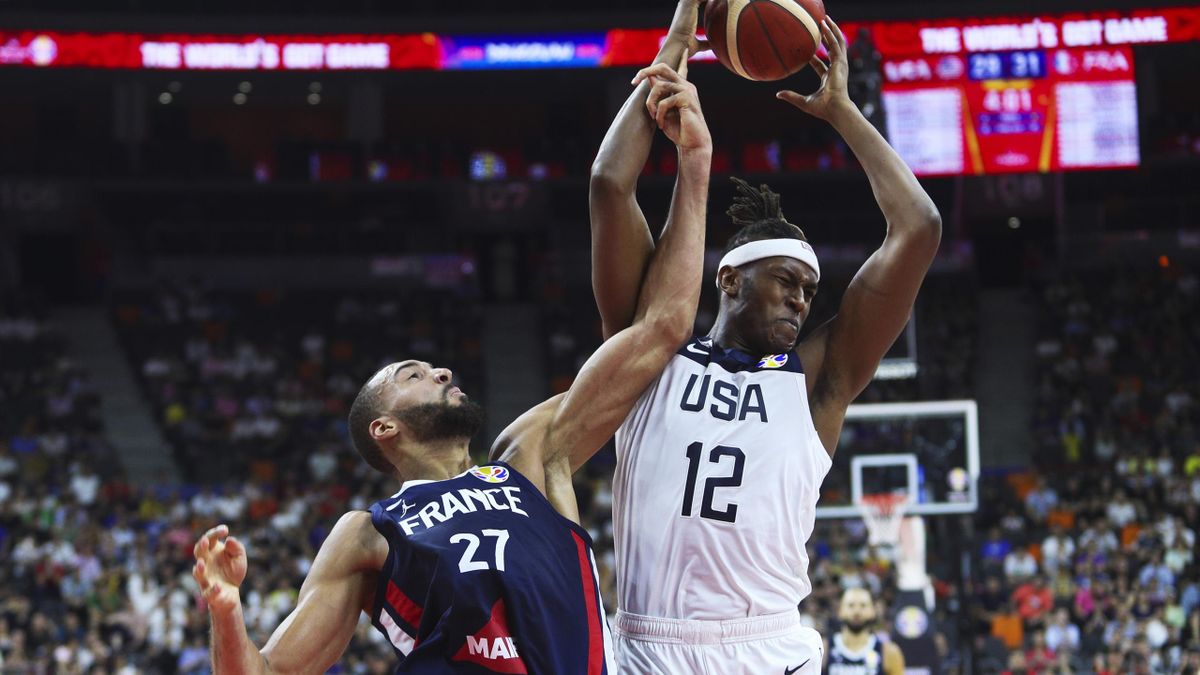 Rudy Gobert #27 of France and Myles Turner #12 of USA fight for a rebound during FIBA World Cup 2019 quarter-final match between the United States and France