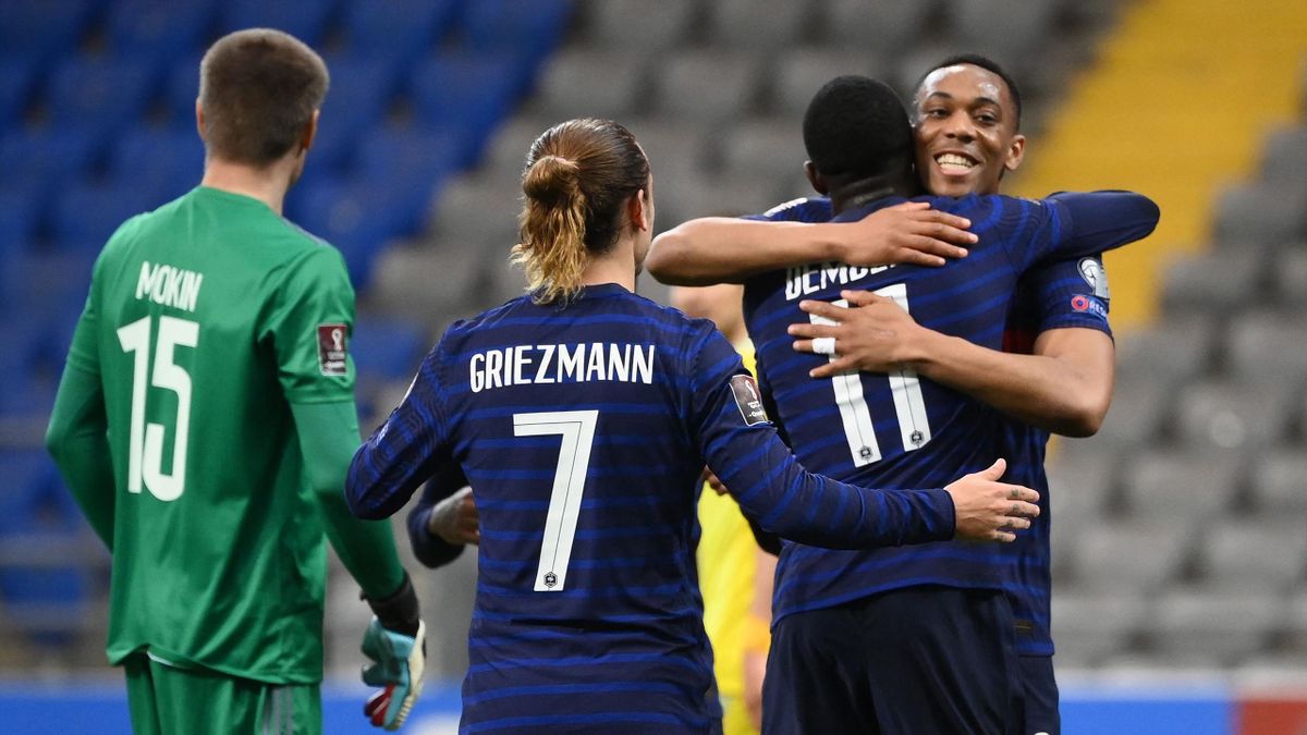 France's forward Ousmane Dembele (2R) celebrates with France's forward Anthony Martial (R) after scoring a goal during the FIFA World Cup Qatar 2022 qualification Group D football match between Kazakhstan and France