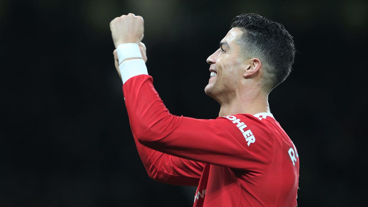 Cristiano Ronaldo of Manchester United celebrates scoring their third goal during the Premier League match between Manchester United and Burnley at Old Trafford on December 30, 2021
