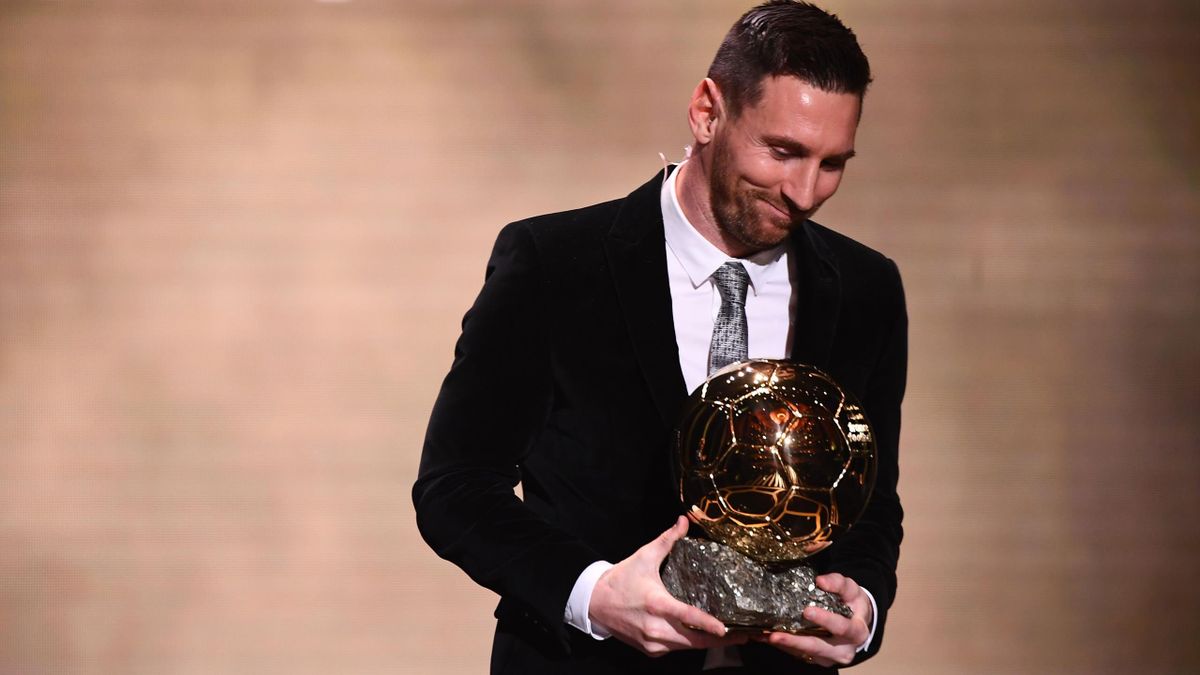 Lionel Messi reacts after winning the Ballon d'Or France Football 2019 trophy at the Chatelet Theatre in Paris on December 2, 2019