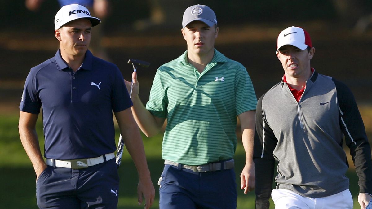 (l-r) Rickie Fowler, Jordan Spieth, and Rory McIlroy in action in Abu Dhabi
