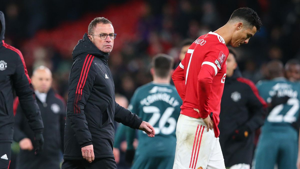Manchester United manager Ralf Rangnick and Cristiano Ronaldo leave the pitch after losing the penalty shoot out during the Emirates FA Cup Fourth Round match between Manchester United and Middlesbrough at Old Trafford on February 04, 2022 in Manchester,
