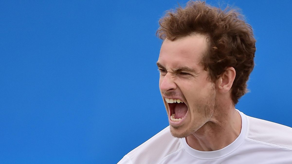Britain's Andy Murray celebrates beating South Africa's Kevin Anderson in the men's singles final match at the ATP Aegon Championships tennis tournament at the Queen's Club in west London on June 21, 2015.