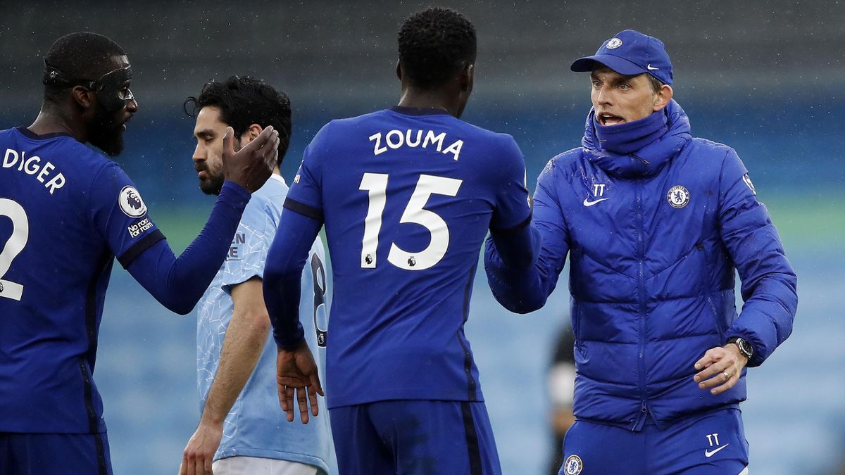 Thomas Tuchel, Manager of Chelsea interacts with Kurt Zouma of Chelsea after the Premier League match between Manchester City and Chelsea at Etihad Stadium