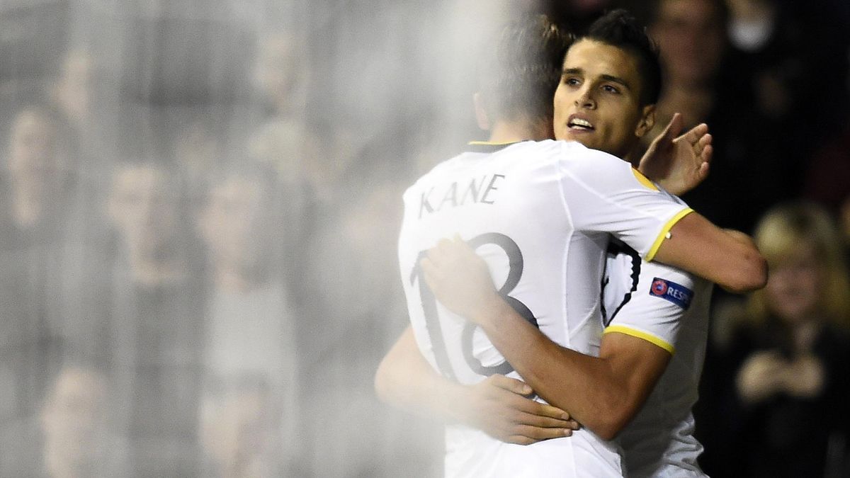 Tottenham Hotspur's Erik Lamela (R) celebrates with team mate Harry Kane after scoring a goal against Asteras Tripolis during their Europa League soccer match at White Hart Lane in London October 23, 2014