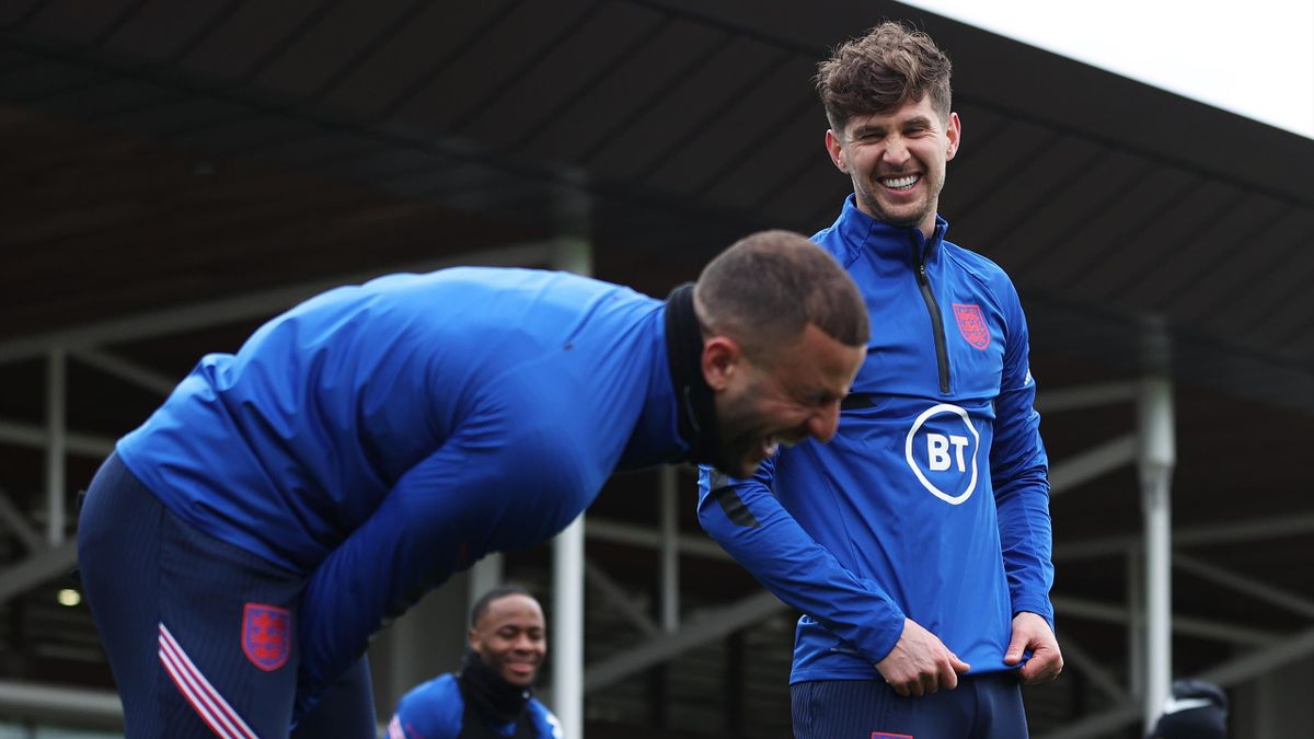 John Stones (right) is back in the England squad