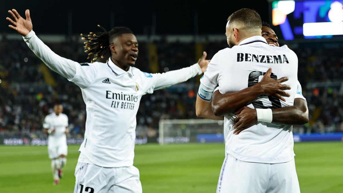 Real Madrid's Karim Benzema celebrates after scoring his team's third goal during the FIFA Club World Cup final football match against Al-Hilal