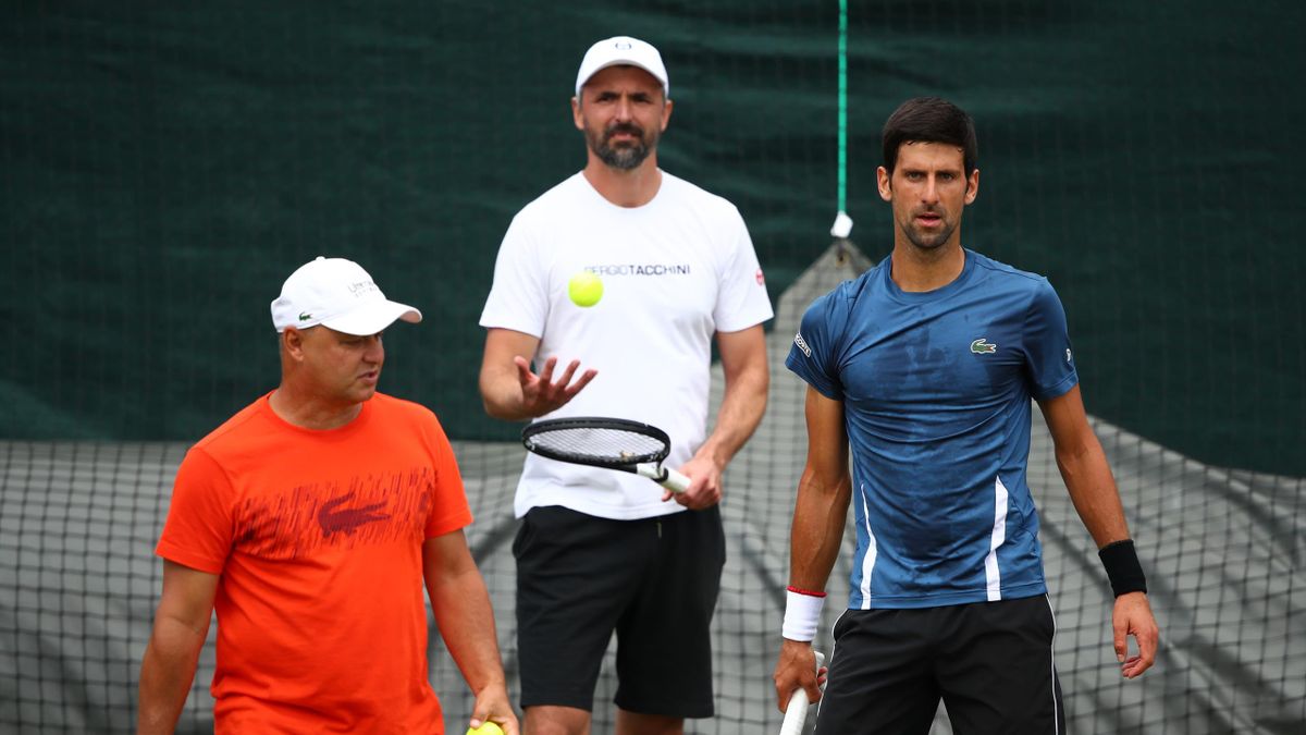 Marian Vajda, Goran Ivanisevic and Novak Djokovic of Serbia look on during a practice session ahead of The Championships - Wimbledon 2019 at All England Lawn Tennis and Croquet Club on June 30, 2019 in London, England.