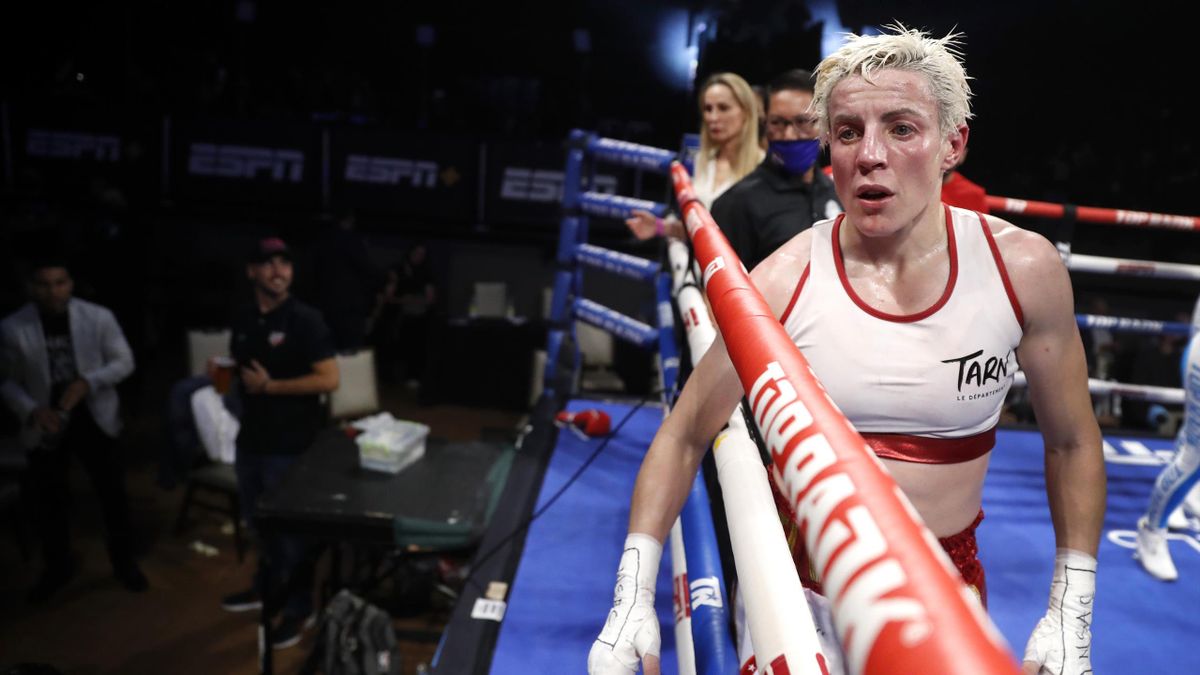 Mavia Hamadouche walks through the ring after losing her IBF title to WBO junior lightweight champion Mikaela Mayer in a title unification fight at Virgin Hotels Las Vegas on November 05, 2021 in Las Vegas, Nevada. Mayer took Hamadouche's title by unanimo