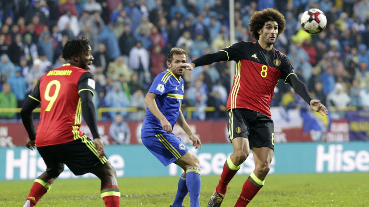 Fellaini, right, during the World Cup Group H qualifying soccer match between Bosnia and Belgium at the Grbavica stadium in Sarajevo, Bosnia, Saturday