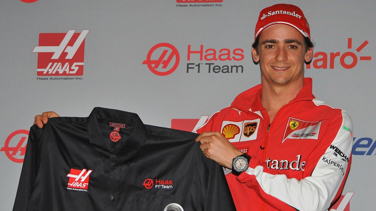 Esteban Gutierrez shows his new team jacket during a press conference to annouce conference to announce that he has signed with the Haas team for the next season, at the Soumaya museum in Mexico City on October 30, 2015