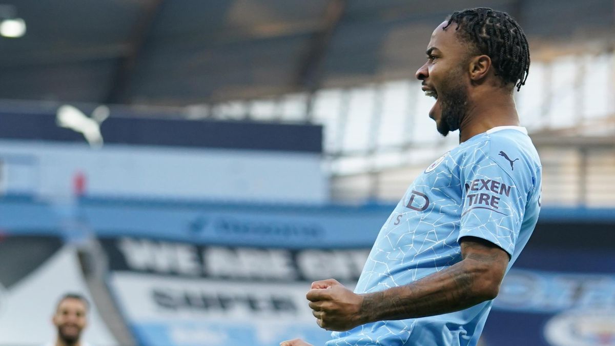 Manchester City's English midfielder Raheem Sterling celebrates scoring his team's first goal during the English Premier League football match between Manchester City and Fulham at the Etihad Stadium in Manchester, north west England, on December 5, 2020