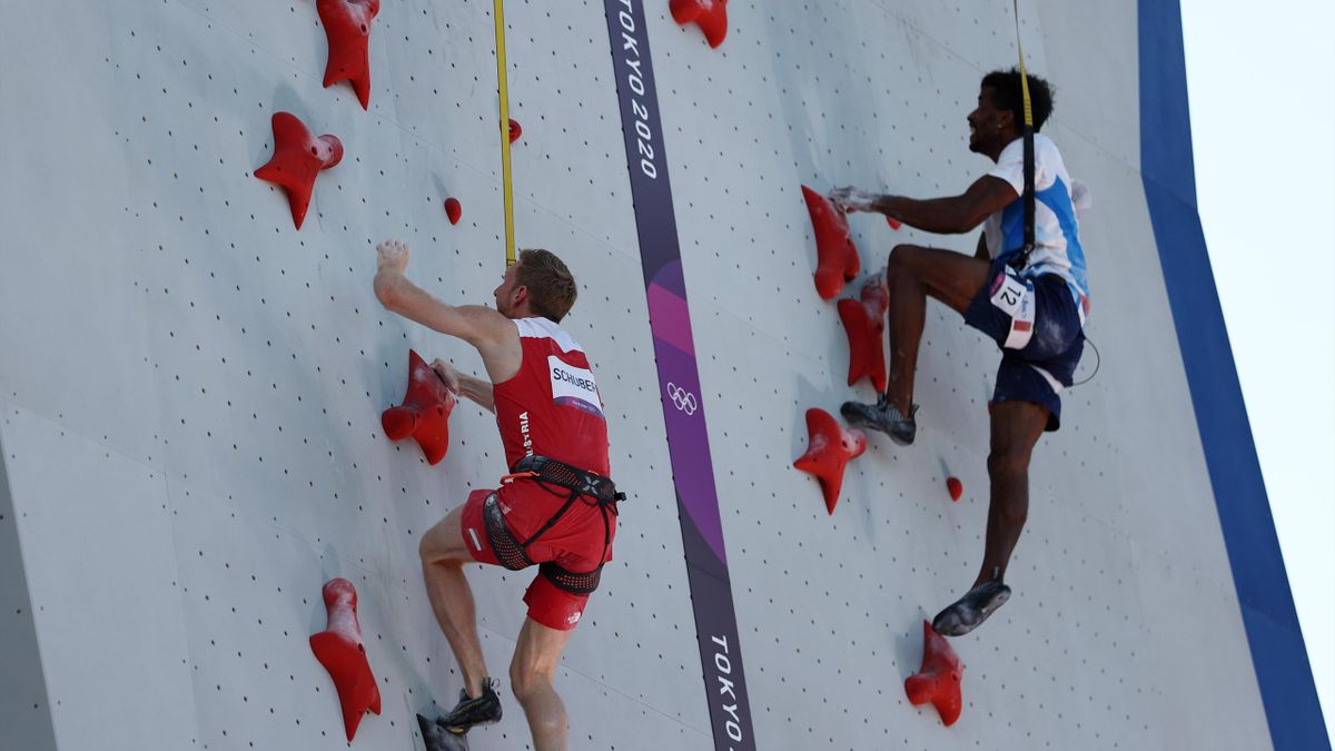 Climbers have to be quick-thinking and agile as they scale the climbing wall