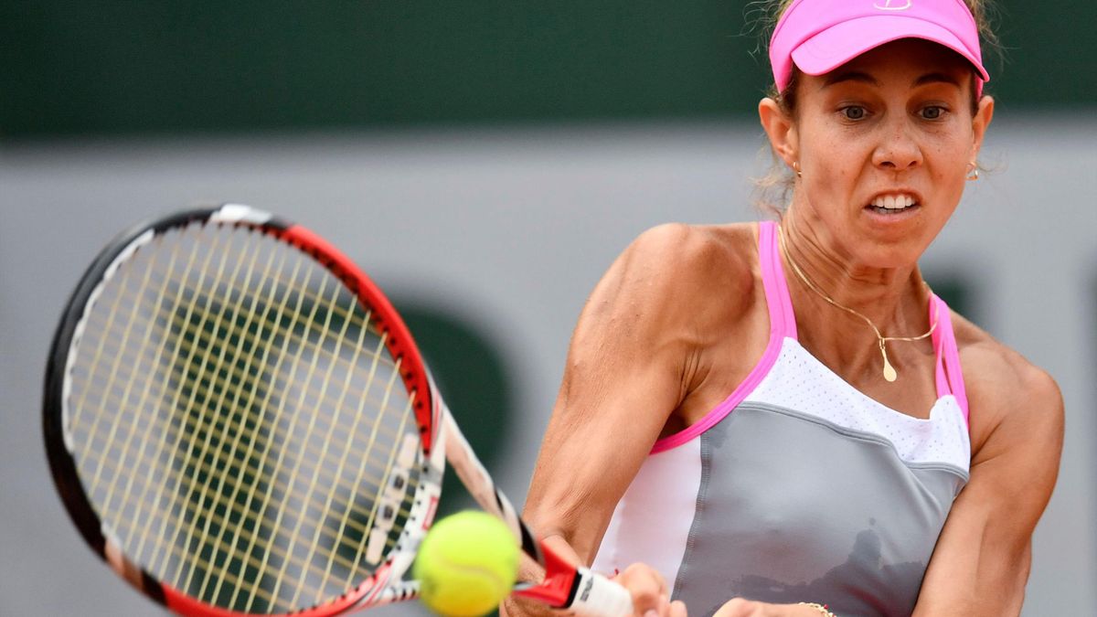 Romania's Mihaela Buzarnescu plays a return to Vania King of the US during their women's singles first round match on day two of The Roland Garros 2018 French Open