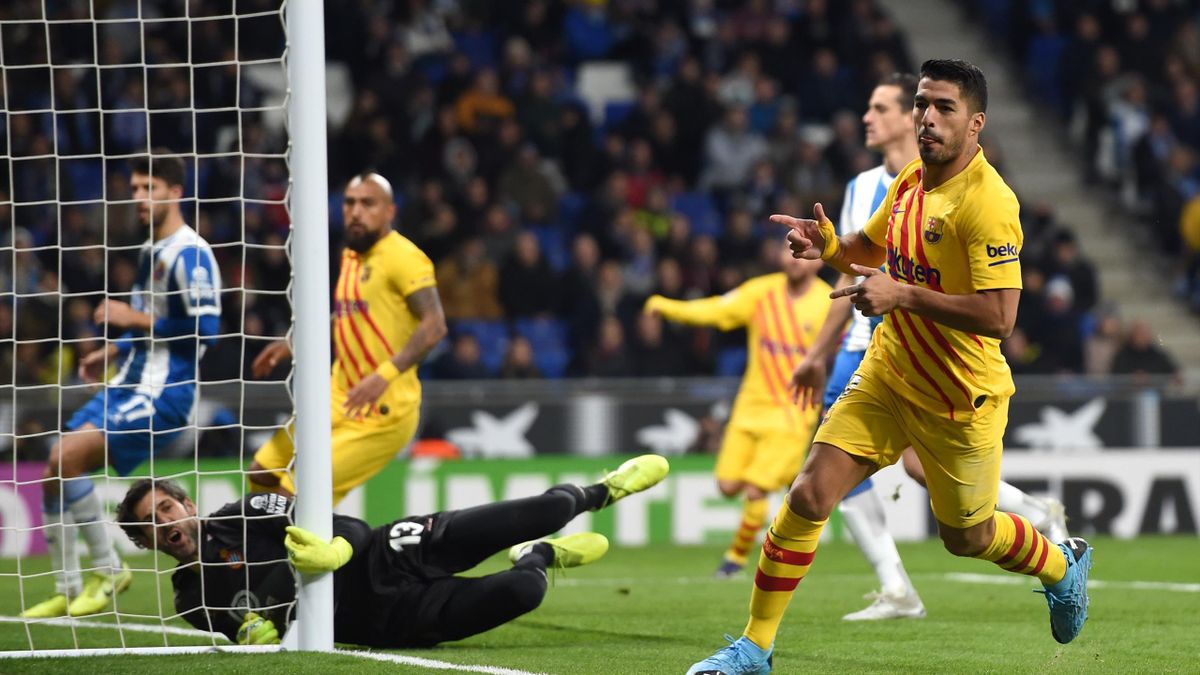 Luis Suarez of FC Barcelona celebrates after scoring his team's first goal during the La Liga match between RCD Espanyol and FC Barcelona at RCDE Stadium on January 04, 2020 in Barcelona, Spain.