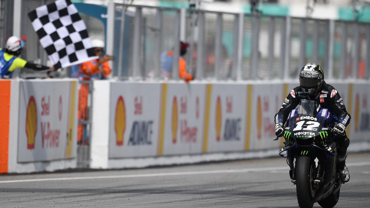 Monster Energy Yamaha's Spanish rider Maverick Vinales crosses the finish line to win the MotoGP-class Malaysian Grand Prix motorcycle race at the Sepang International Circuit in Sepang on November 3, 2019