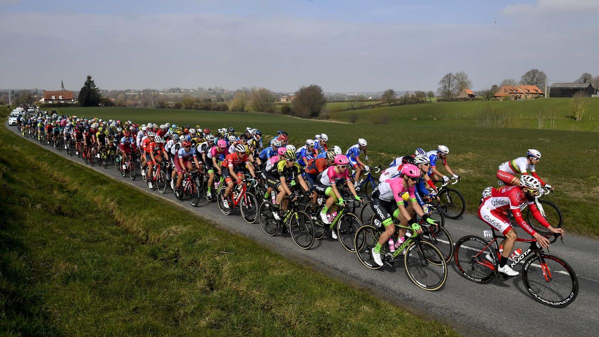 France's Geoffrey Soupe of Cofidis (R) leads the pack as they ride during the 80th edition of the Gent-Wevelgem cycling race, 251,1 km from Deinze, near Gent, to Wevelgem on March 25, 2018. Slovakia's Peter Sagan, the world road-race champion, sprinted to
