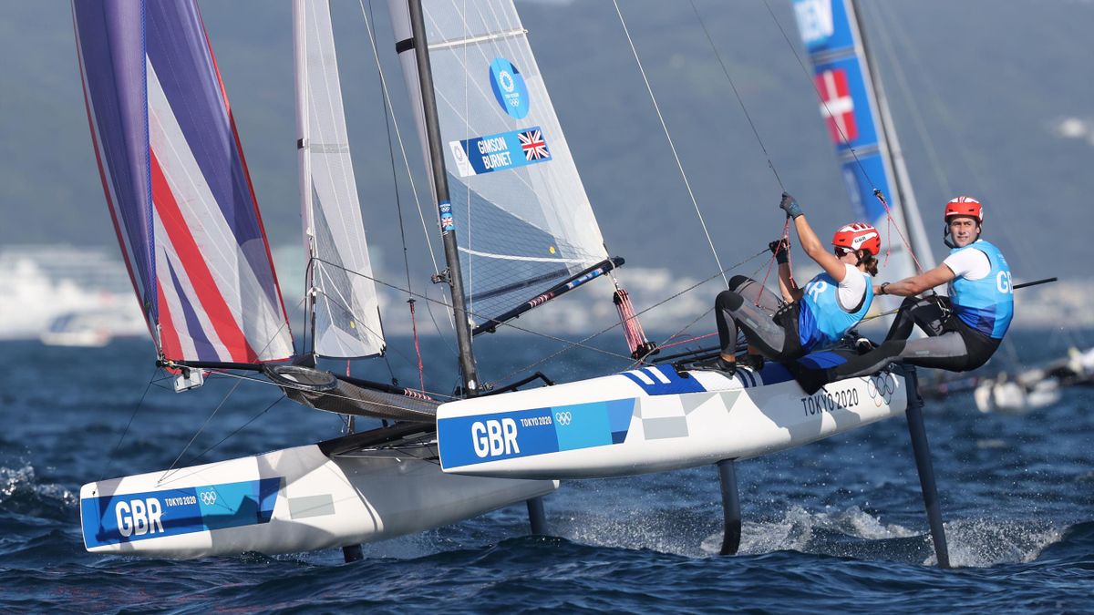 John Gimson and Anna Burnet of Team Great Britain compete in the Nacra 17 Foiling class on day eleven of the Tokyo 2020 Olympic Games