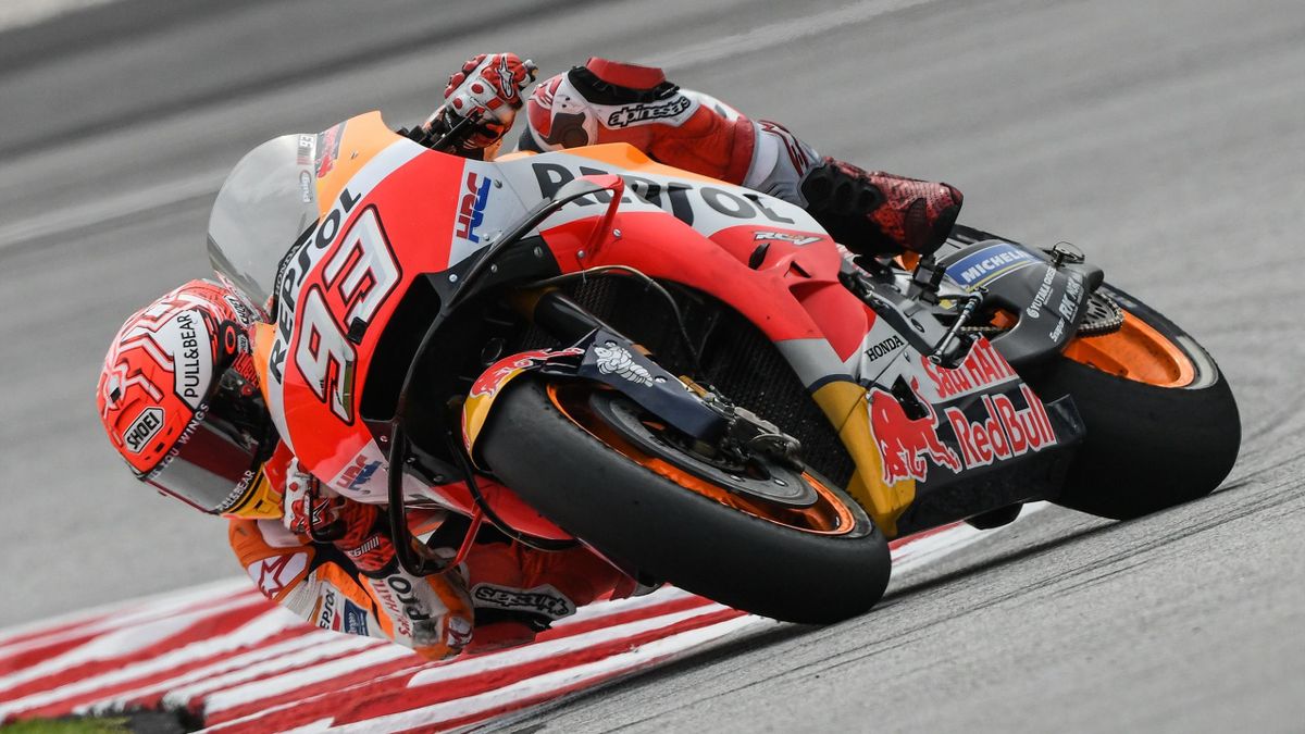 Repsol Honda Team's Spanish rider Marc Marquez negotiates a corner during the second practice session of the Malaysia MotoGP at the Sepang International circuit in Sepang on November 2, 2018