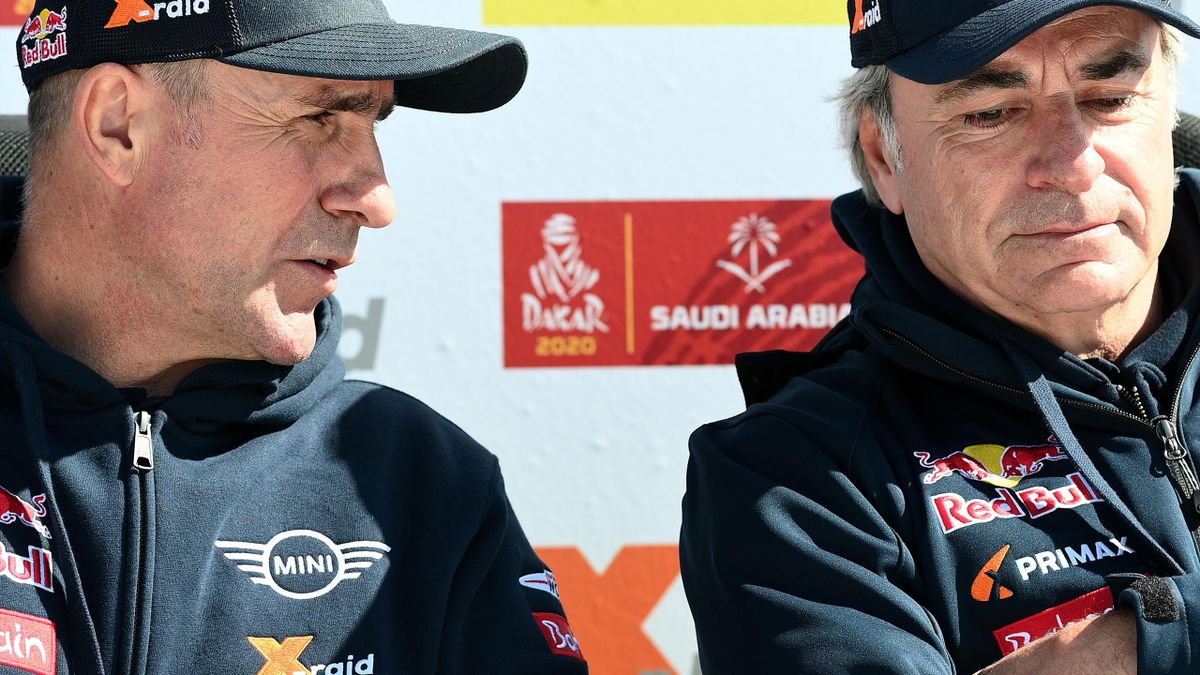 Le Français Stéphane Peterhansel (à gauche) et l'Espagnol Carlos Sainz seront associés dans l'équipe du constructeur allemand Audi lors du Dakar 2022