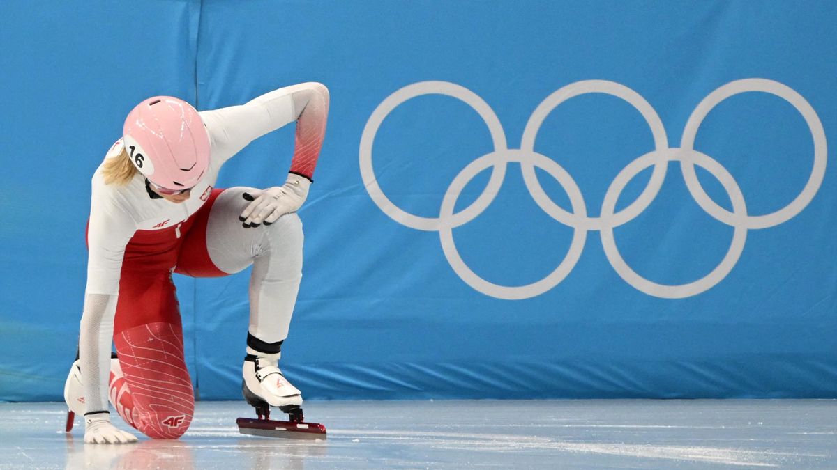 Poland's Natalia Maliszewska reacts after falling in a quarter-final heat of the women's 1000m short track speed skating event during the Beijing 2022 Winter Olympic Games at the Capital Indoor Stadium in Beijing on February 11, 2022.