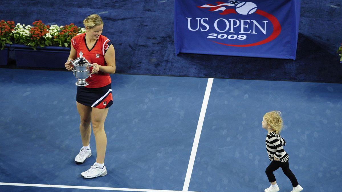 Tennis player Kim Clijsters from Belgium is joined by her daughter Jada after winnings against Caroline Wozniacki from Denmark during the Women's final of the 2009 US Open at the USTA Billie Jean King National Tennis Center, in New York, September 13, 200