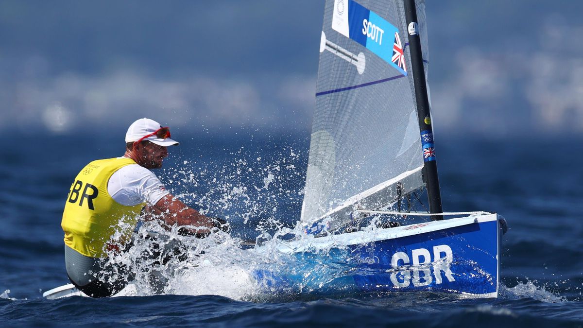Great Britain's Giles Scott has secured a medal in the Finn at the Tokyo 2020 Olympic Games