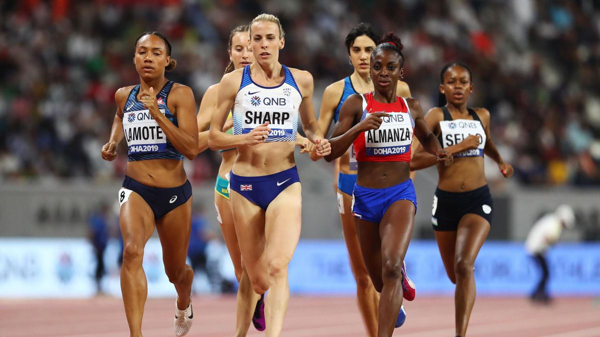 DOHA, QATAR - SEPTEMBER 27: Lynsey Sharp of Great Britain, Renelle Lamote of France and Rose Mary Almanza of Cuba compete in the Women's 800 metres heats during day one of 17th IAAF World Athletics Championships Doha 2019 at Khalifa International Stadium