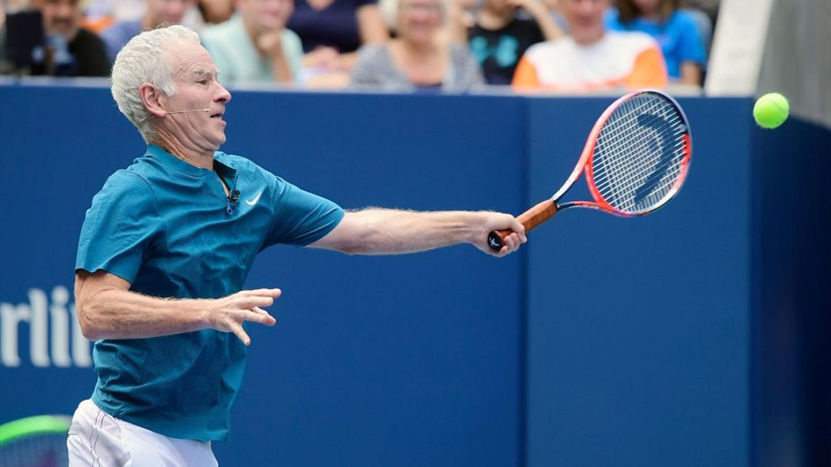 NEW YORK, NY - AUGUST 22: Former professional tennis player John McEnroe in action during an exhibition match after the Louis Armstrong Stadium Dedication Ceremony at USTA Billie Jean King National Tennis Center on August 22, 2018 in New York City. (Photo