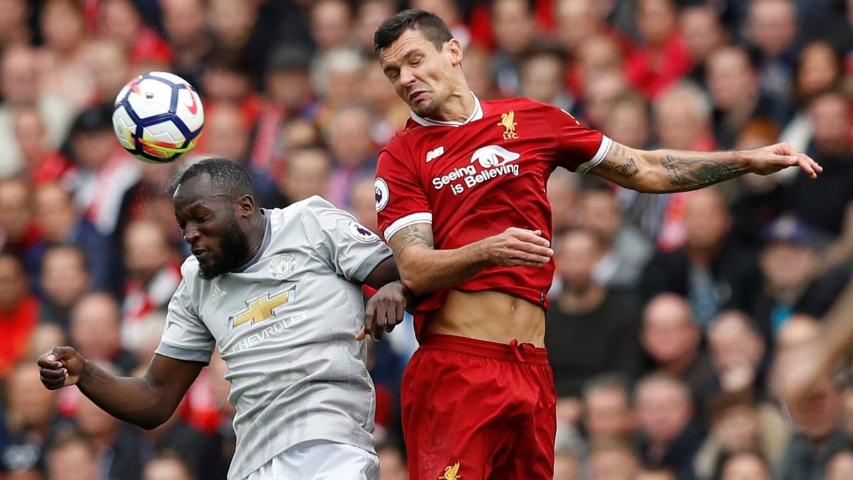 Manchester United's Romelu Lukaku in action with Liverpool's Dejan Lovren