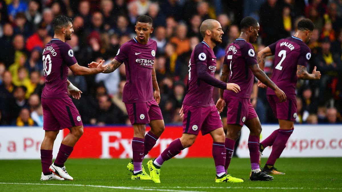 Manchester City's Sergio Aguero and Gabriel Jesus celebrate combining for a goal against Watford