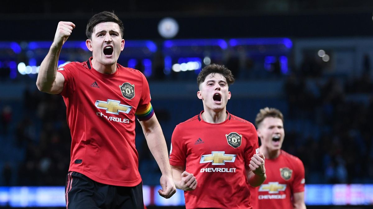 : Harry Maguire and Daniel James of Manchester United celebrate following their sides victory during the Premier League match between Manchester City and Manchester United at Etihad Stadium on December 07, 2019 in Manchester, United Kingdom.