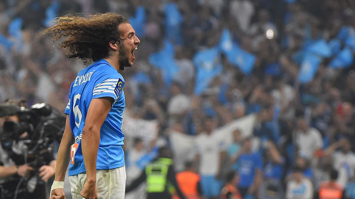 Marseille's French midfielder Matteo Guendouzi reacts following their 4-0 win at the end of the French L1 football match between Olympique Marseille (OM) and RC Strasbourg Alsace at Stade Velodrome in Marseille, southern France on May 21, 2022.