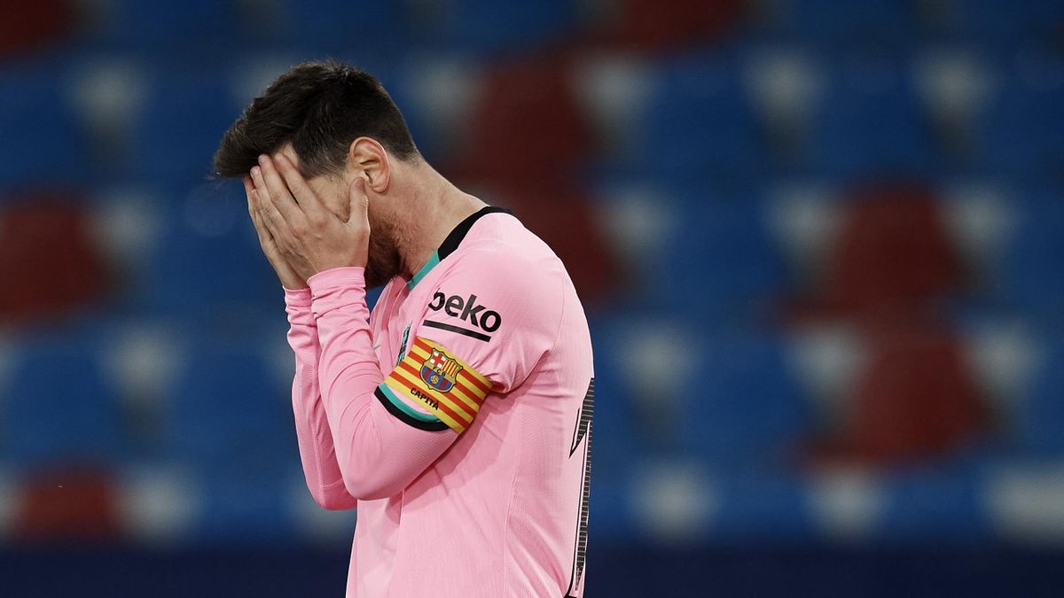 Lionel Messi of Barcelona lament a failed occasion during the La Liga Santander match between Levante UD and FC Barcelona at Ciutat de Valencia Stadium on May 11, 2021 in Valencia, Spain.