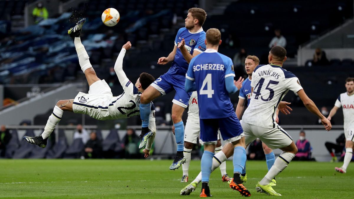 Dele Alli of Tottenham Hotspur scores their team's first goal with a overhead kick during the UEFA Europa League Round of 32 match between Tottenham Hotspur and Wolfsberger AC at The Tottenham Hotspur Stadium on February 24, 2021 in London, England