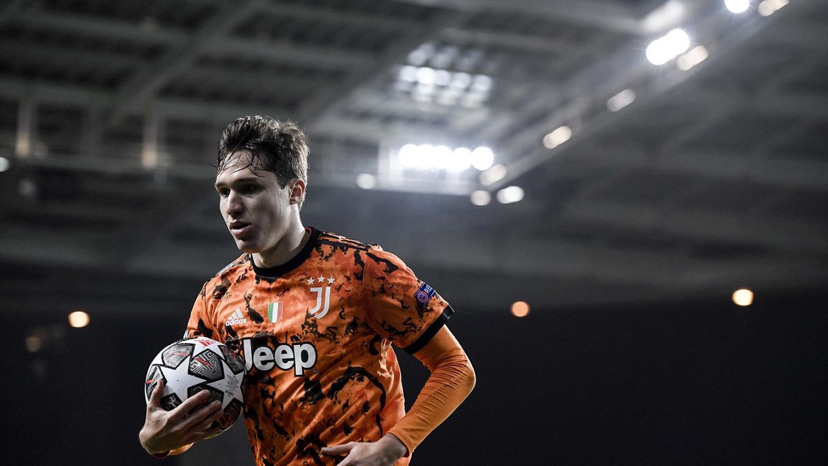 Federico Chiesa of Juventus in action during the UEFA Champions League Round of 16 match between FC Porto and Juventus at Estadio do Dragao on February 17, 2021 in Porto, Portugal.