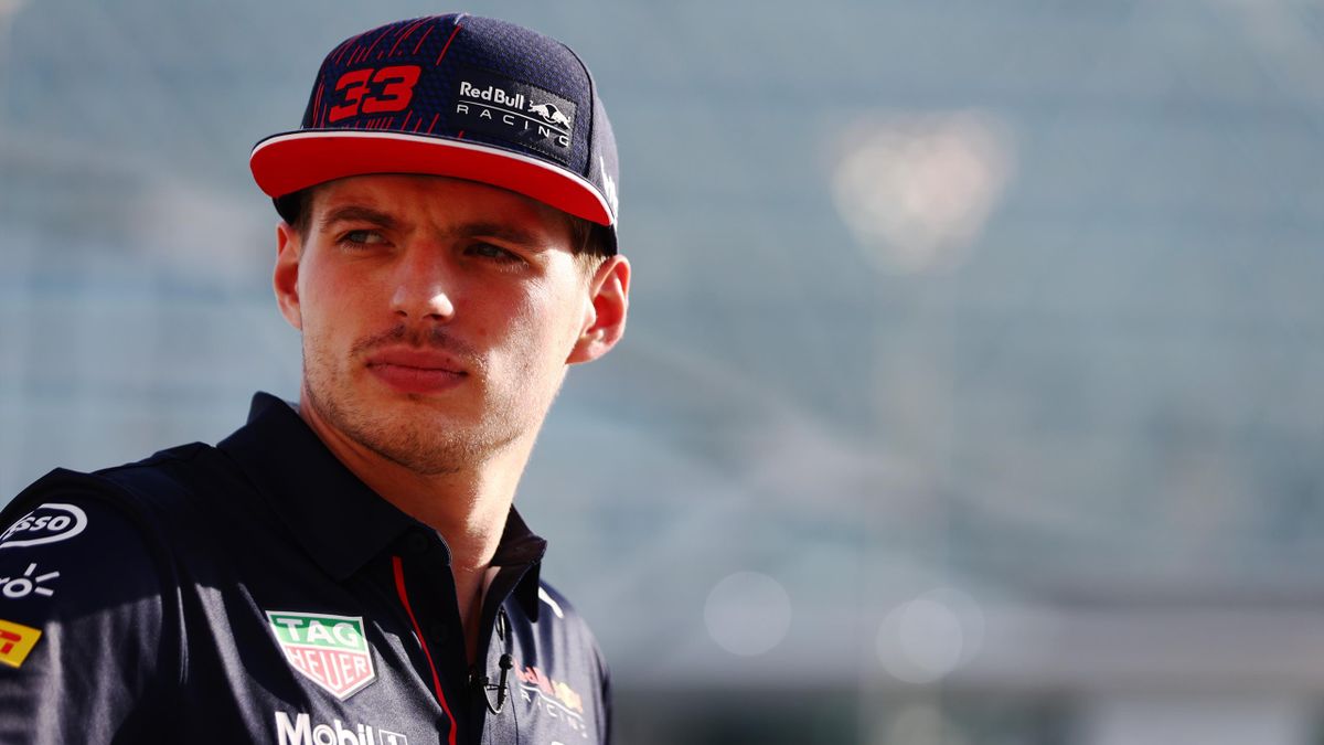 Max Verstappen of Netherlands and Red Bull Racing looks on in the Paddock during previews ahead of the F1 Grand Prix of Abu Dhabi at Yas Marina Circuit on December 09, 2021 in Abu Dhabi, United Arab Emirates