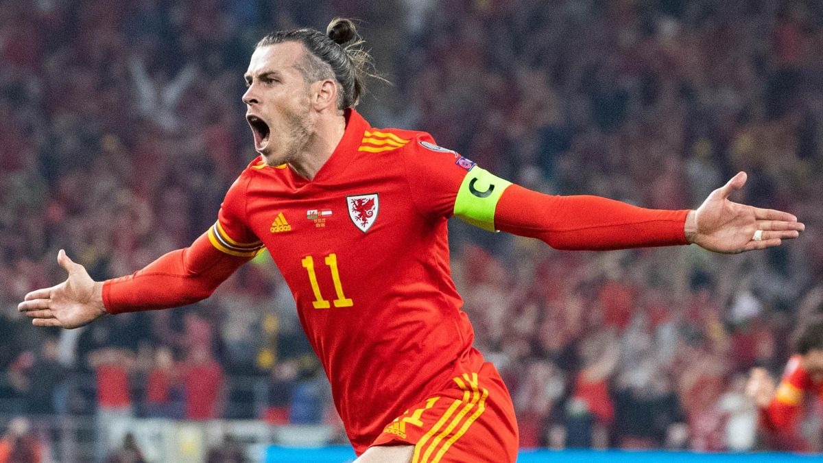 Gareth Bale of Wales celebrates after scoring a goal during the 2022 FIFA World Cup Qualifier knockout round play-off match between Wales and Austria at Cardiff City Stadium