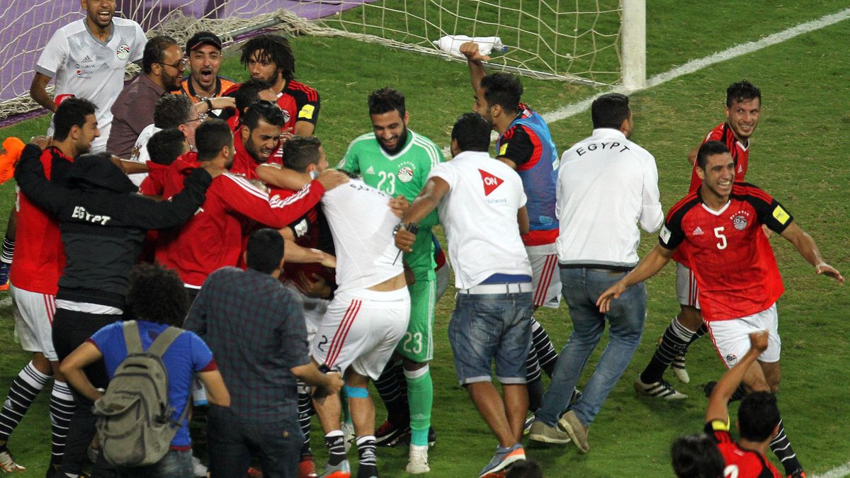 Egypt's team players celebrate wining against Congo's team during their World Cup 2018 Africa qualifying match between Egypt and Congo at the Borg el-Arab stadium in Alexandria on October 8, 2017. Liverpool striker Mohamed Salah converted a stoppage-time