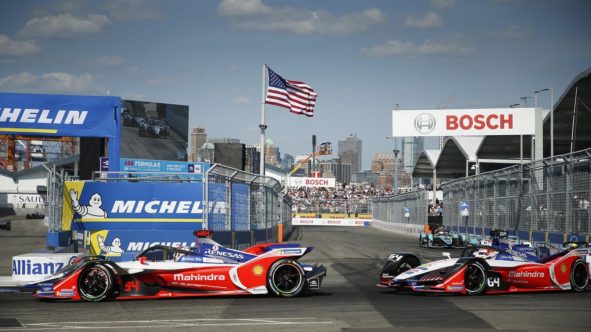 Drivers Pascal Wehrlein and Jerome D'Ambrosio of Mahindra race during the 2019 New York City ePrix on July 14, 2019 in New York City