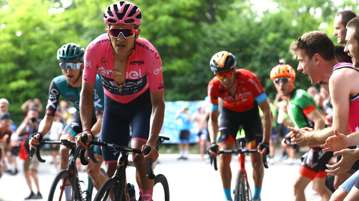 Jai Hindley of Australia and Team Bora - Hansgrohe, Richard Carapaz of Ecuador and Team INEOS Grenadiers Pink Leader Jersey and Mikel Landa Meana of Spain and Team Bahrain Victorious compete while fans cheer during the 105th Giro d'Italia 2022, Stage 19