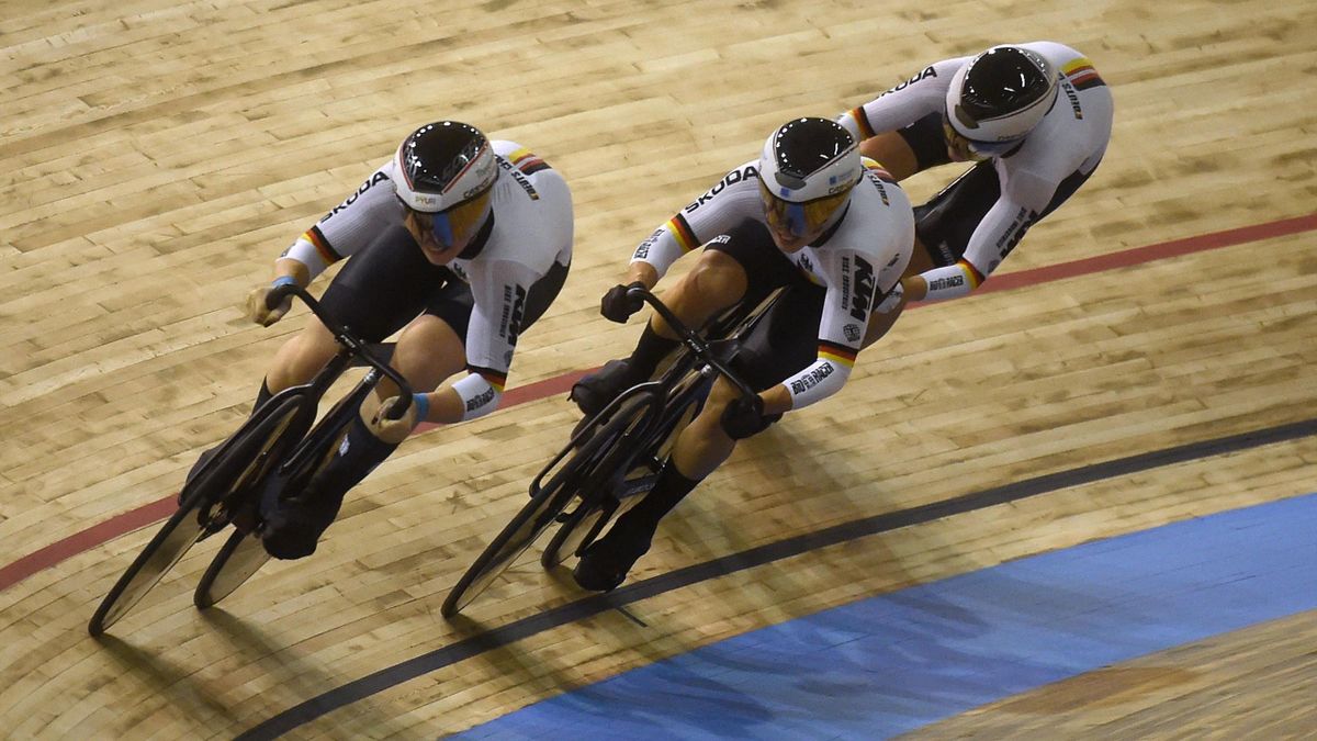 German team's members Lea Sophie Friedrich, Pauline Sophie Grabosch and Emma Hinze compete in the women's Team Sprint first round during the UCI Track Cycling World Championships