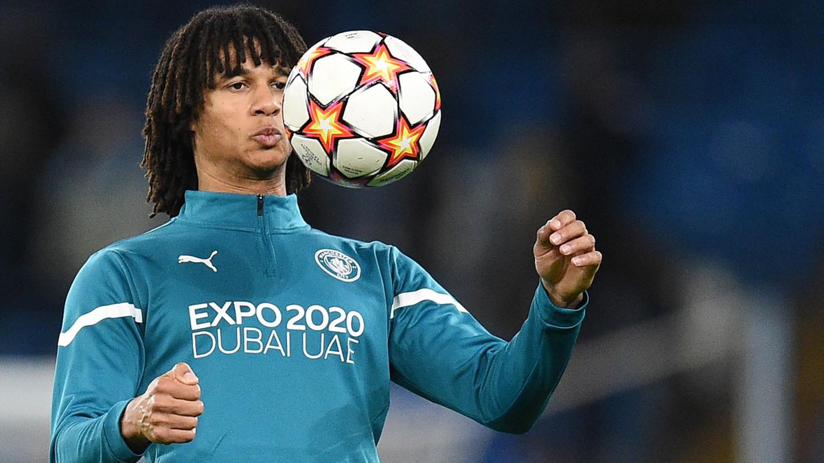 Nathan Ake warms up ahead of the UEFA Champions League Group A football match between Manchester City and Paris Saint-Germain